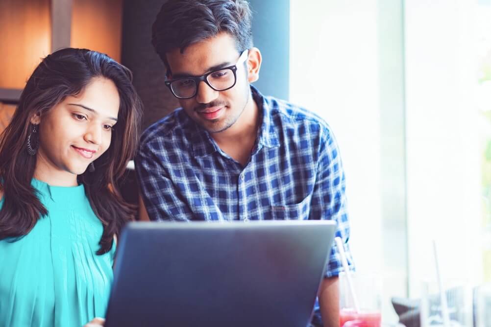 Couple checking which game gives the best lotto odds