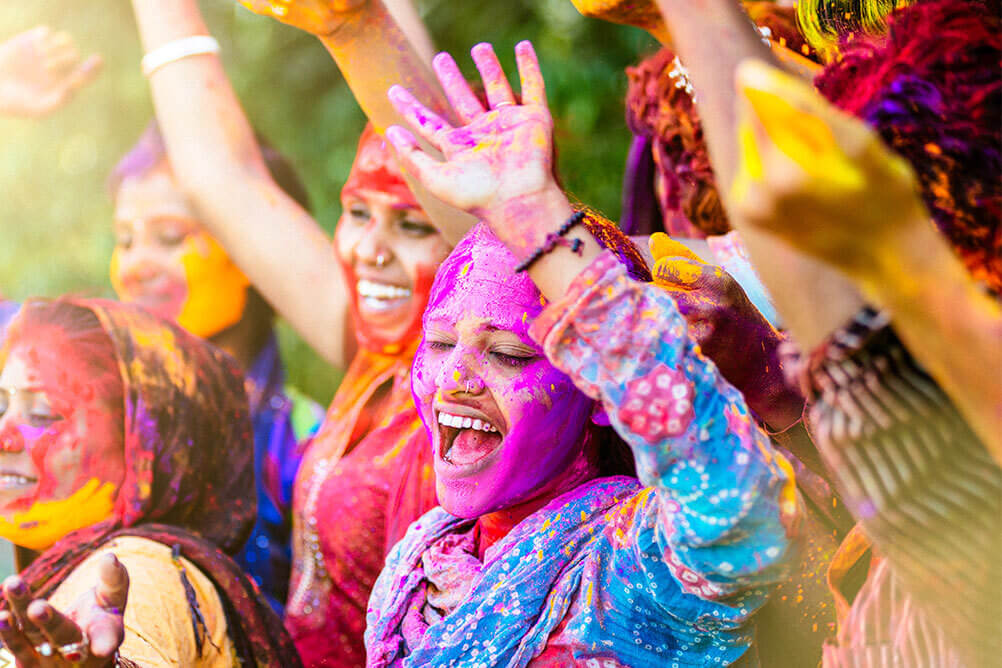 Happy people celebrating Holi festival in India