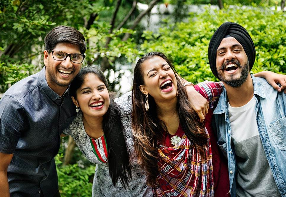 Group of Indian friends celebrating the MegaMillions jackpot